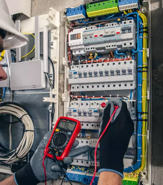 man-electrical-technician-working-switchboard-with-fuses